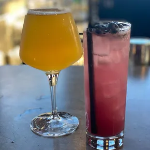 two glasses of beer and a drink