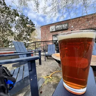 a pint of beer on a table