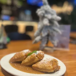 a plate of pastries on a table