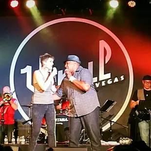 a band performing on stage