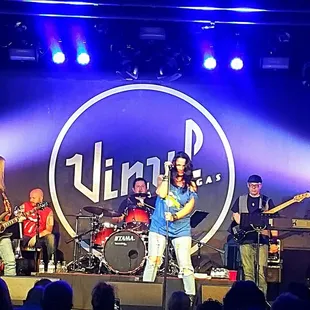 a band performing on stage