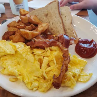 Standard breakfast: 2 eggs, bacon, home fries &amp; toast (it's a lot!)