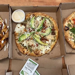 Left to right - gyro pie, pesto chicken pie, margharita pie - one 8" pies with soda for lunch special $13