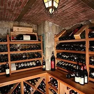 a wine cellar full of wine bottles