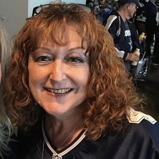 Sharon E.