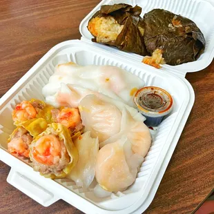 a meal in a styrofoam container