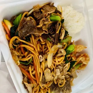 Mongolian barbecue plate with chicken, beef and pork with chef special sauce and ginger &amp; garlic sauce.
