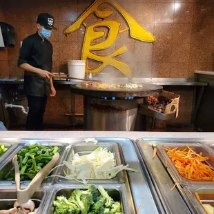 a man preparing food in a restaurant