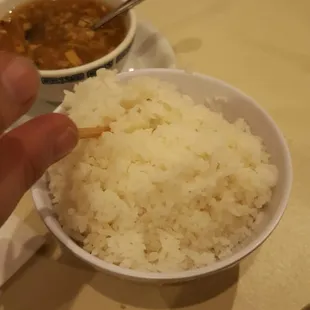 Two serving of steamed rice, free with the buffet