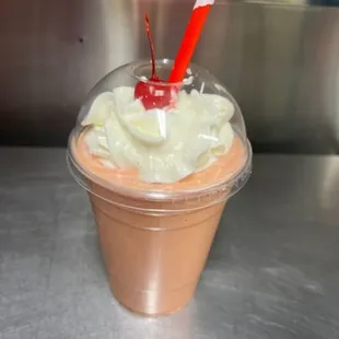 a smoothie in a plastic cup