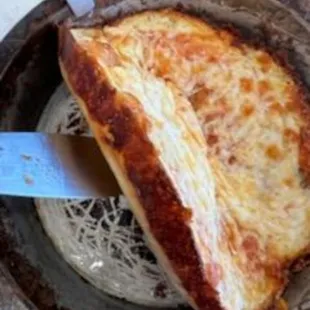 a slice of cheese pizza