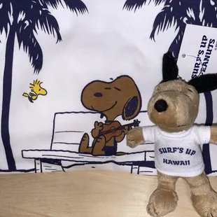 Took home Snoopy playing Ukulele T-shirt and Keychain Snoopy doll. All Hawaii Snoopys have a tan