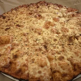 a cheese pizza in a box