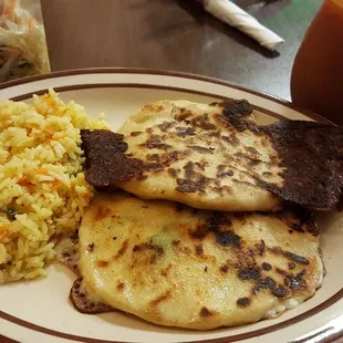 Bean and cheese pupusa, cheese and jalapeno pupusa with a side of rice. Rice has nice buttery flavor.