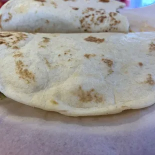 two burritos on a plate