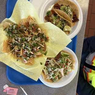 Chips with pico, two fish tacos, and one Carnitas and one Adobado taco