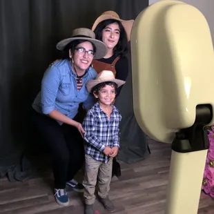 Kid friendly. The booth can be adjusted so that the little ones can be in the pictures.