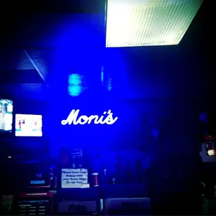 the neon sign for moni's