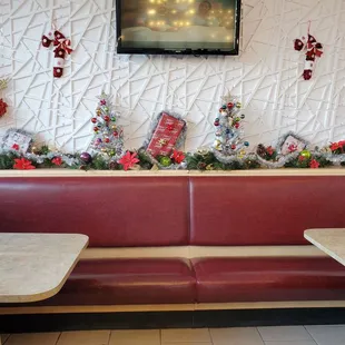 Beautiful and Colorful Christmas Decorations at the back booth areas inside Moni's Restaurant.  11/26/2024