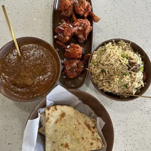 Goat masala Manchurian Fried Rice  6 Pieces Drums of Heaven  Tikka Masala Desi (Entree)