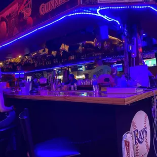 a bar with neon lights