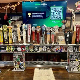 All kinds of beer handles at the bar