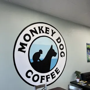a table and chairs in a coffee shop