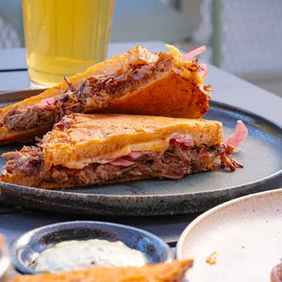 a plate of sandwiches and fries