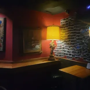 a bar with a brick wall