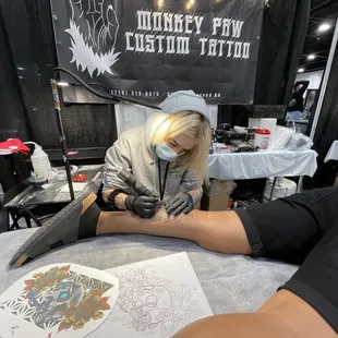 Eliana Velasquez tattooing at the '21 Denver Tattoo Arts Convention