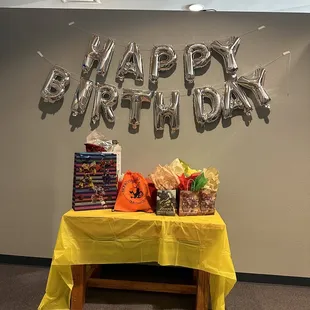 Balloons and gift bag all included