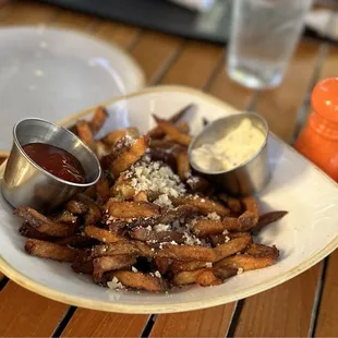Hand cut hand made garlic truffle fries with Parmesan &amp; aioli sauce  Appetizer! Yummy