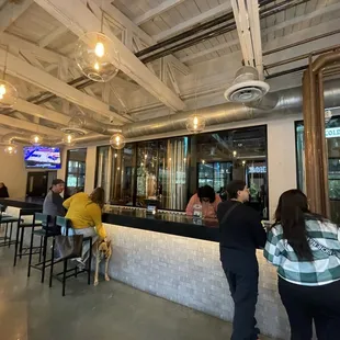 patrons at the bar
