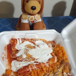 Enchiladas, beans, and rice. 7/11/24