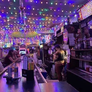 a colorfully lit bar