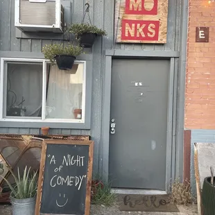 a sign for a night of comedy