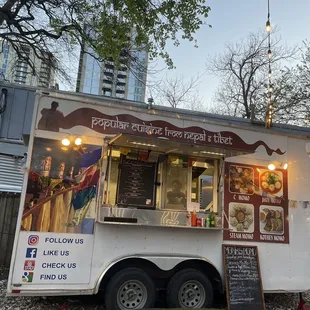 a food truck parked in front of a building