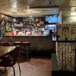 a view of the bar and dining area