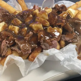 Monk's has THE best poutine fries. They're good. Like crazy good!