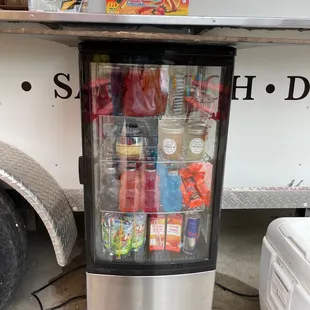 a vending machine with a variety of snacks