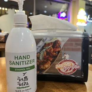 Hand sanitizer at every table!