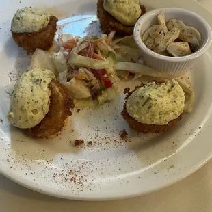 The crab deviled eggs are costed with panko?, served hot; deviled yoke part&apos;s served cold.  We got the crab on the side. DELICIOUS!