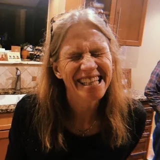 ROBYN C.