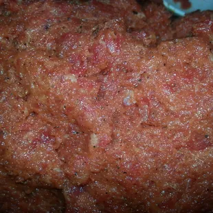 a close up of a meatball