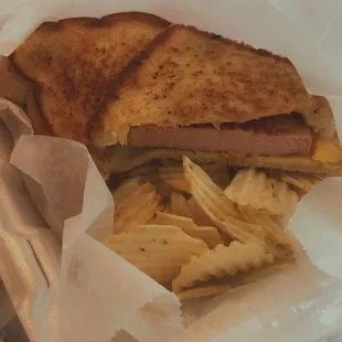a sandwich and chips