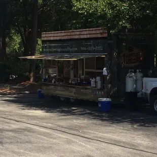 a food truck parked on the side of the road
