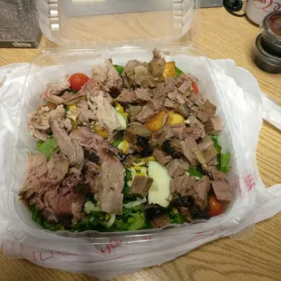 smokehouse salad with brisket and pork.