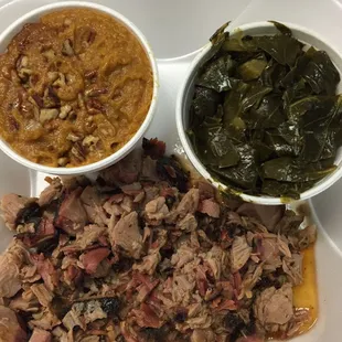 Carolina Pork plate with collard greens and sweet potato soufflé