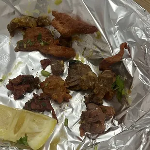 Chicken, al pastor and asada all with big chunks of fat and nerve