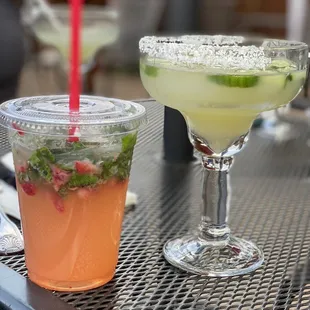 Happy hour strawberry mojito ($5) that I did not order and cucumber margarita happy hour special ($11 with a tostada)